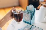SINGLE SERVE INSTANT KONA & HAWAIIAN COFFEES, JUST + WATER